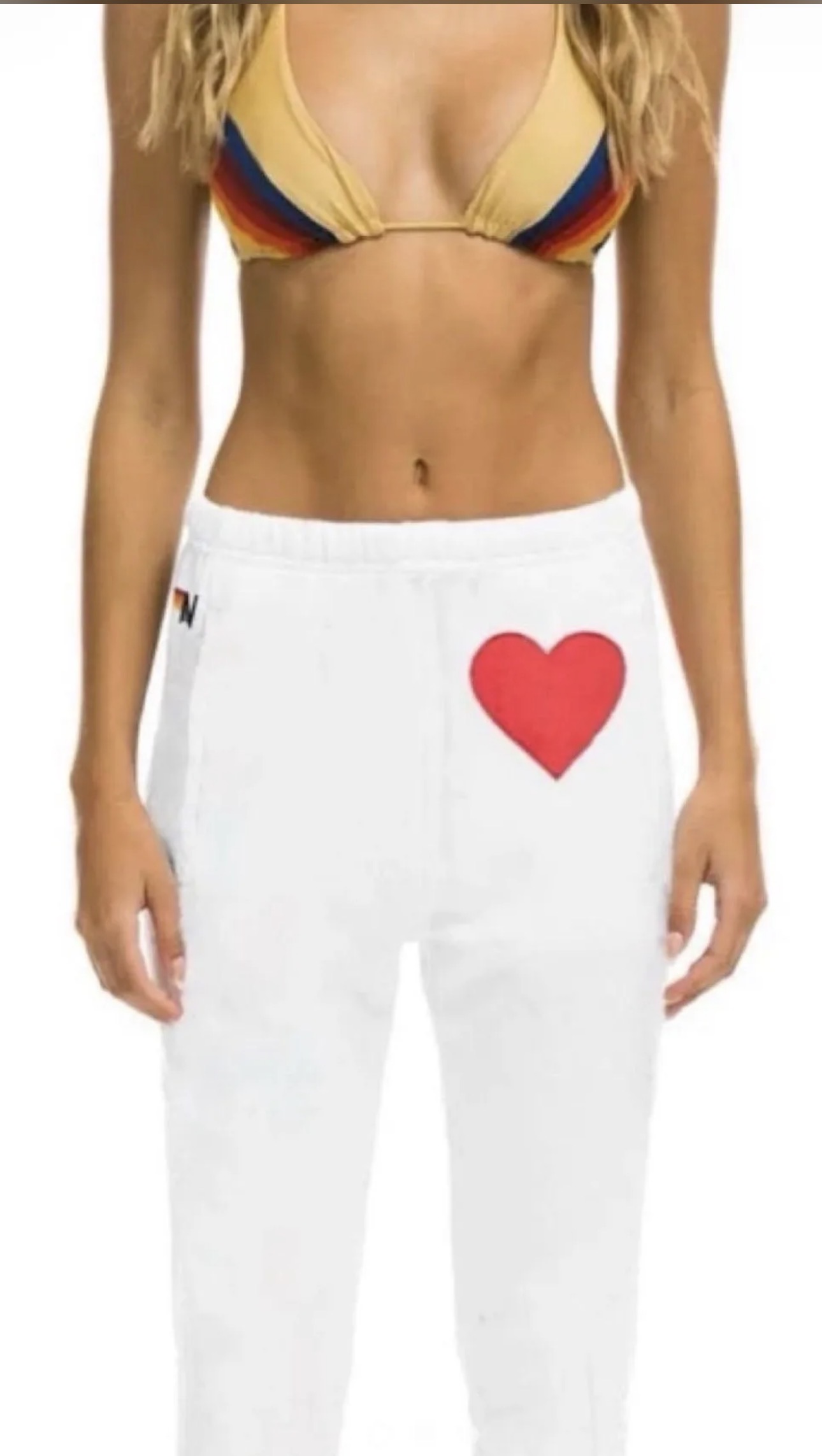 Aviator Nation white sweatpants with a red heart stitch detail